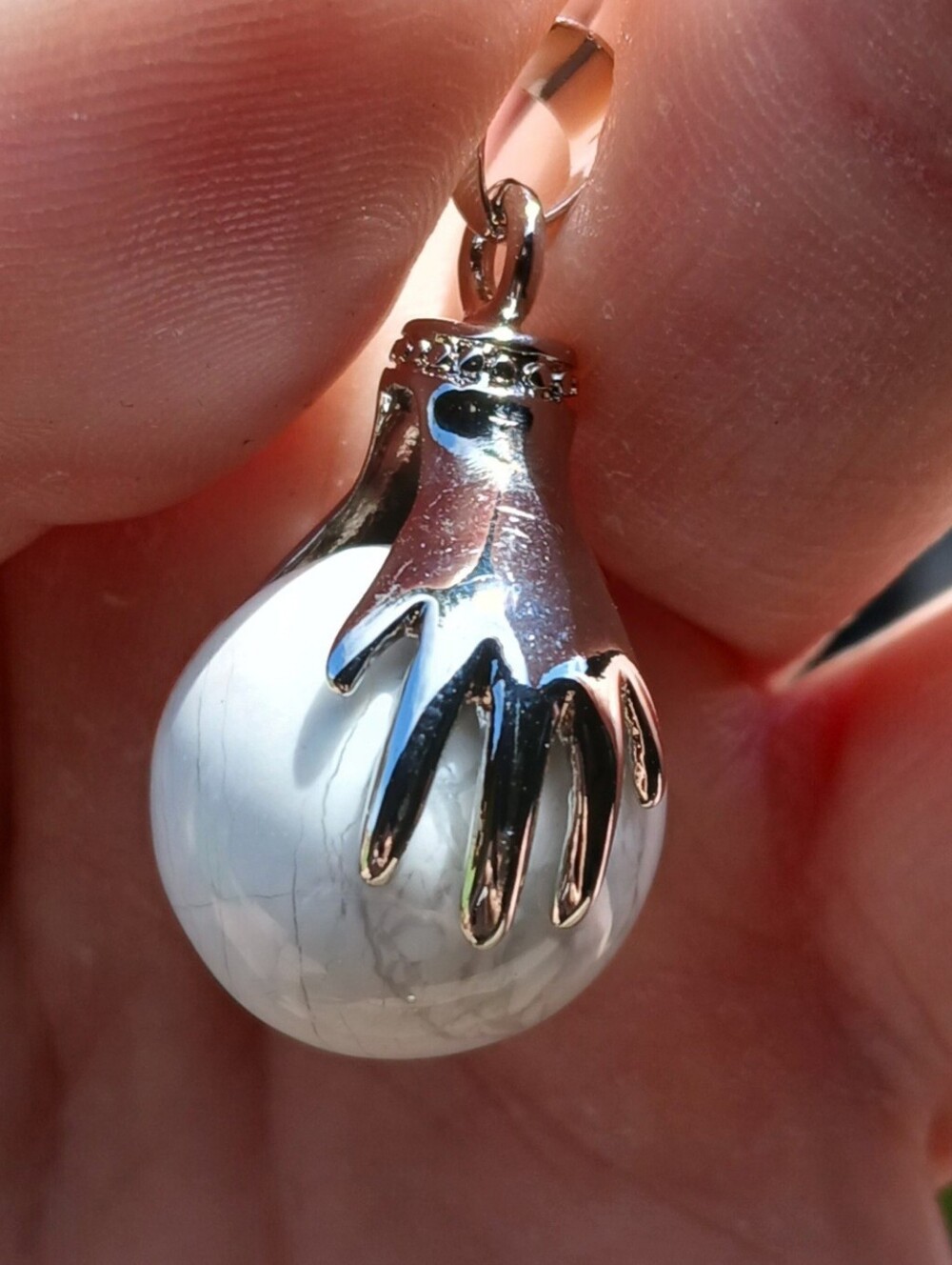 New 18K Hands Holding Howlite Sphere Pendant.
